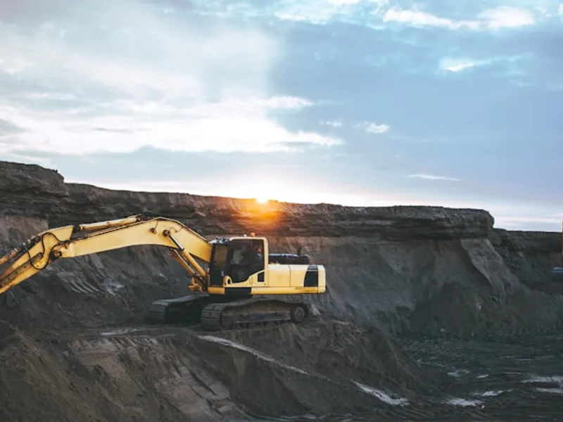 Undercarriage track systems for heavy mining equipment